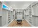 Spacious walk-in closet featuring custom shelving and center ottoman seating at 985 Shipmaster Ave., Myrtle Beach, SC 29579