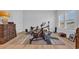 Exercise room featuring an exercise bike, weight-lifting, and hard wood floors at 1004 Whooping Crane Dr., Conway, SC 29526