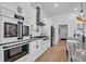 Gourmet kitchen with stainless steel appliances, white cabinets, and lots of storage space at 1004 Whooping Crane Dr., Conway, SC 29526