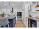 Open concept kitchen with center island, wine cooler and stainless appliances at 1004 Whooping Crane Dr., Conway, SC 29526
