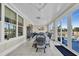 Bright sun room featuring large windows and a tile floor at 1004 Whooping Crane Dr., Conway, SC 29526