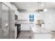 Modern kitchen featuring stainless steel appliances, granite countertops and white cabinetry at 1005 Laconic Dr., Myrtle Beach, SC 29588