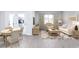 Inviting living room and dining area featuring stylish furnishings and natural light at 1005 Laconic Dr., Myrtle Beach, SC 29588
