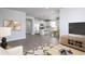 Open-concept living area featuring a kitchen, dining area, and a cozy living room at 1005 Laconic Dr., Myrtle Beach, SC 29588