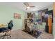 Spare bedroom featuring gray vinyl floors and a ceiling fan that can serve as a hobby room at 101 Winding Path Dr., Loris, SC 29569