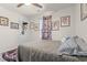 Comfortable bedroom features a barn door curtain, unique art, and neutral décor at 101 Winding Path Dr., Loris, SC 29569