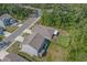 Aerial view of a home with a large fenced-in backyard, patio, and mature trees in a quiet neighborhood at 1011 Maxwell Dr., Little River, SC 29566
