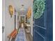 Inviting entryway featuring a wooden bench, stylish lighting, and modern decor at 1011 Maxwell Dr., Little River, SC 29566