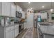 Well-equipped kitchen with modern appliances, granite countertops, and ample cabinet space at 1011 Maxwell Dr., Little River, SC 29566