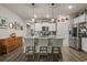Bright kitchen featuring an island with seating, pendant lighting, and modern finishes at 1011 Maxwell Dr., Little River, SC 29566