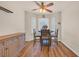 Cozy breakfast nook featuring a round table, three chairs, and lots of natural light from the bay windows at 1014 Academy Dr., Conway, SC 29526