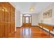 Foyer with hardwood floors, chandelier and solid wood front door at 1014 Academy Dr., Conway, SC 29526