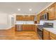 Functional kitchen with stainless steel appliances, ample cabinet space, and contemporary flooring for an appealing cooking area at 1014 Academy Dr., Conway, SC 29526