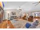 Bright and spacious living room with fireplace, hardwood floors, modern décor, and a comfortable seating arrangement at 1014 Academy Dr., Conway, SC 29526