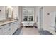 Elegant bathroom with a clawfoot tub and modern fixtures at 1033 Tuckers Rd., Pawleys Island, SC 29585