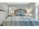 Comfortable bedroom featuring a plush bed and soft lighting at 1033 Tuckers Rd., Pawleys Island, SC 29585