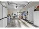 Spacious garage with overhead storage, organized cabinets, and ample room for parking at 1033 Tuckers Rd., Pawleys Island, SC 29585