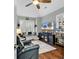 Cozy den featuring a comfy recliner, multiple TV screens, and a relaxing window seat at 1033 Tuckers Rd., Pawleys Island, SC 29585