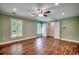 Open bedroom showcasing hardwood floors, and a bright airy space at 107 Azalea Dr., Conway, SC 29526