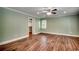 Spacious bedroom features hardwood floors and a ceiling fan at 107 Azalea Dr., Conway, SC 29526