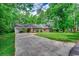 Charming single-story brick home with a covered carport and a well-maintained lawn at 107 Azalea Dr., Conway, SC 29526