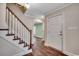 Inviting foyer with hardwood floors and a staircase leading to the upper level at 107 Azalea Dr., Conway, SC 29526