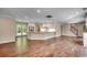 Open-concept living space with hardwood floors, white trim, and seamless flow at 107 Azalea Dr., Conway, SC 29526