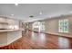Inviting living room features an open layout, hardwood floors, and ample natural light at 107 Azalea Dr., Conway, SC 29526