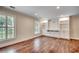 Comfortable living room with built-in shelving, hardwood floors, and natural light at 107 Azalea Dr., Conway, SC 29526