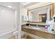 Clean bathroom area with vanity and granite counters, and shower with tub at 1105 S Ocean Blvd. # 1024, Myrtle Beach, SC 29572