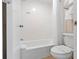 Bright bathroom features a shower-tub combo, toilet, and towel rack for convenience at 1105 S Ocean Blvd. # 1024, Myrtle Beach, SC 29572