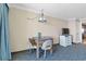 Comfortable dining area features a table, chairs, and TV at 1105 S Ocean Blvd. # 1024, Myrtle Beach, SC 29572