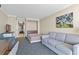 Cozy living space features a murphy bed, comfortable sofa, and stylish decor at 1105 S Ocean Blvd. # 1024, Myrtle Beach, SC 29572