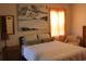 Relaxing bedroom featuring a comfortable bed, and natural light at 1145 Forest Dr., North Myrtle Beach, SC 29582