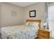 Cozy bedroom with a queen-sized bed and beach-themed decor at 126 N Waccamaw Dr. # 101, Garden City Beach, SC 29576