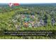 Aerial view of community homes, pond, and proximity to beach at 130 Hagar Brown Rd., Murrells Inlet, SC 29576