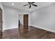 Bedroom with hardwood floors leading to a stairway at 130 Hagar Brown Rd., Murrells Inlet, SC 29576