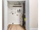 Finished basement utility area with a hot water heater and shelving at 131 Oak Log Lake Rd., Conway, SC 29526
