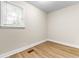 Comfortable bedroom featuring wood floors, base trim and bright window at 131 Oak Log Lake Rd., Conway, SC 29526