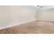 An empty bedroom with wood-look floors, ceiling fan, and neutral walls at 131 Oak Log Lake Rd., Conway, SC 29526