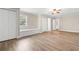 Spacious bedroom features a window seat, multiple closets, and wood-look floors at 131 Oak Log Lake Rd., Conway, SC 29526