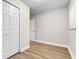 Simple bedroom with wood floors, base trim and a built-in closet at 131 Oak Log Lake Rd., Conway, SC 29526