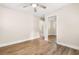 A bright bedroom with sleek, mirrored closet doors and modern ceiling fan at 131 Oak Log Lake Rd., Conway, SC 29526
