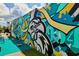 Vibrant outdoor mural featuring colorful abstract designs and a prominent eagle motif at 131 Oak Log Lake Rd., Conway, SC 29526