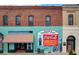 Charming Papa's General Store front with vintage Coca-Cola mural on a historic brick building at 131 Oak Log Lake Rd., Conway, SC 29526