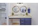Well-lit bathroom with double mirrors, decor, and drawer storage at 1356 Glenns Bay Rd. # 208M, Surfside Beach, SC 29575