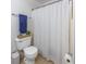 Clean bathroom with a toilet, shower, and organized bathroom decor at 1356 Glenns Bay Rd. # 208M, Surfside Beach, SC 29575