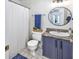 Bathroom featuring vanity, shower with curtain, and an oval mirror at 1356 Glenns Bay Rd. # 208M, Surfside Beach, SC 29575
