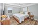 Bright bedroom with hardwood floors, a ceiling fan and a window at 1356 Glenns Bay Rd. # 208M, Surfside Beach, SC 29575