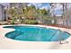 Inviting community pool with clear blue water, perfect for relaxation and recreation at 1356 Glenns Bay Rd. # 208M, Surfside Beach, SC 29575